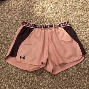 Light pink and dark purple under armour shorts